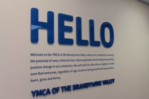 Clear laser cut acrylic letters back laminated with blue vinyl and vinyl wall graphics - West Chester, PA